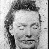 Mortuary photograph of Stride: a woman with angular features and a wide mouth