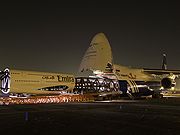 Polet Airlines An-124 swallowing Emirates Airbus A380.jpg