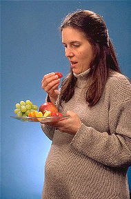 Pregnant woman eating.jpg