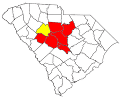 El área metropolitana de Columbia resaltada en rojo. En amarillo el condado de Newberry, con el que conforma el área metropolitana combinada de Columbia - Newberry.