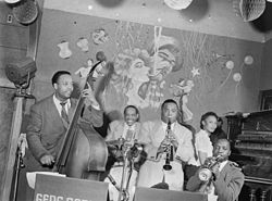 Gene Sedric, Danny Settle, Slick Jones, Mary Lou Williams, and Lincoln Mills, The Place, New York, N.Y., ca. July 1946 (William P. Gottlieb).jpg