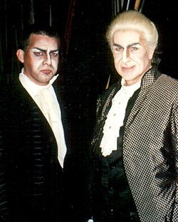 Sherril Milnes (Scarpia, right) and Roberti (left), Festival Puccini, Torre del Lago (1997).jpg