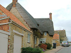 Variety of roofing materials, Weekley, Northants - geograph.org.uk - 151234.jpg