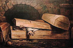 Un ataúd de madera en una bóveda de piedra siendo abierta por una figura en su interior.