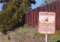 A photograph of a Neighborhood Watch sign in color